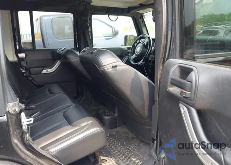 2015 Jeep Wrangler Unlimited Sahara from USA, damaged, VIN 1C4HJWEG3FL661568